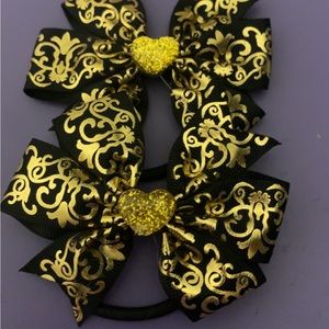 Black and gold shiny design pony tail bow